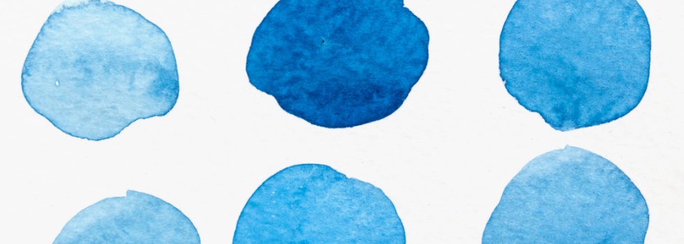 A set of six watercolour blue circles in different shades.