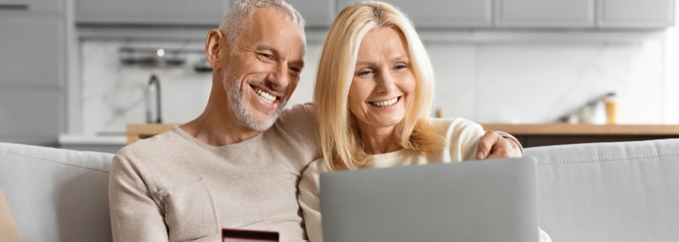 Happy couple shopping online