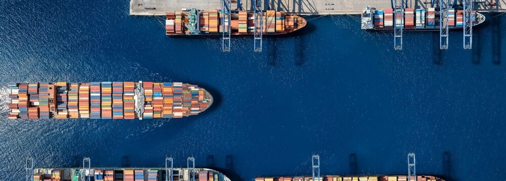 An aerial view of a cargo ship harbour.